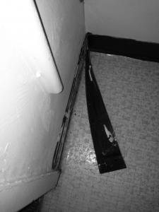 Contributed photo: Students have also found that rubber moldings in their rooms are falling off the walls.